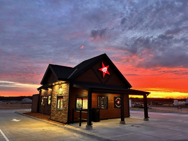 the Papillion cabin coffee with sunset in the background